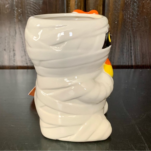 Mummy Girl Holding Candy Corn Ceramic Halloween Mug - Picture 12 of 14